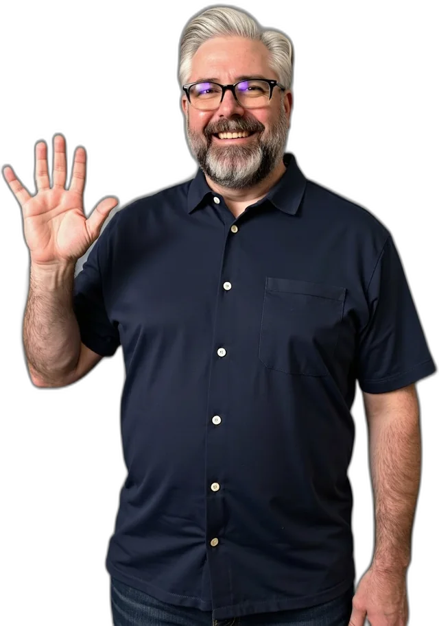 Jeremy Kenerson, founder of DeskTeam360, smiling and waving